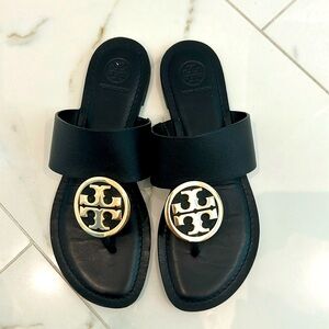 Black and gold Tory Burch sandals